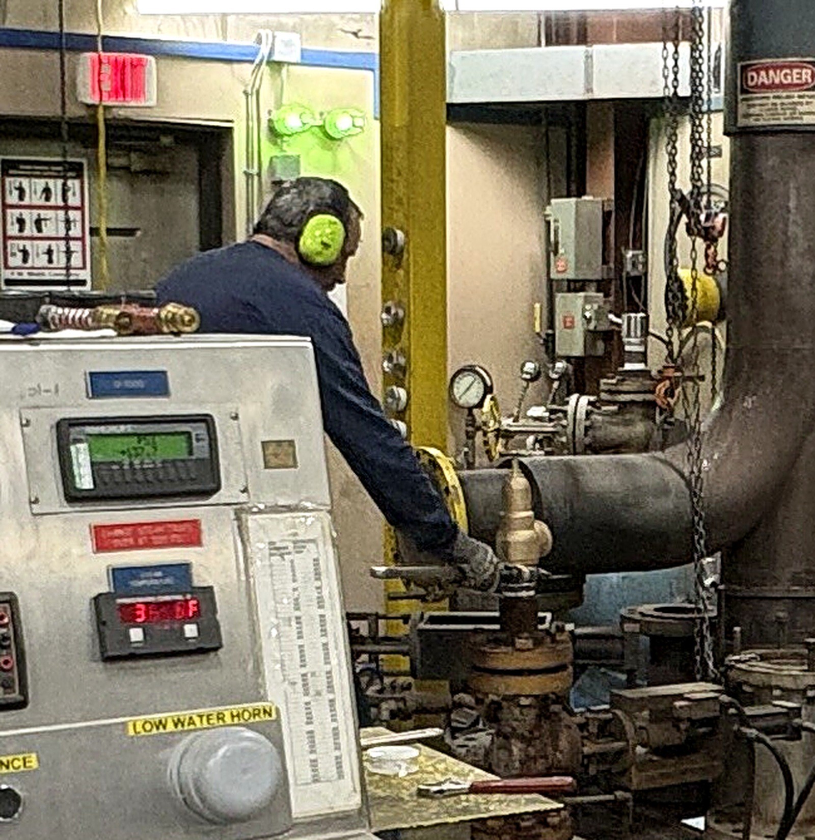 F.W. Webb technician servicing industrial valve equipment in a testing facility